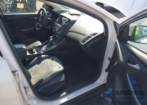 2012 Ford Focus Titanium z USA, uszkodzony, nr VIN 1FAHP3J26CL318858